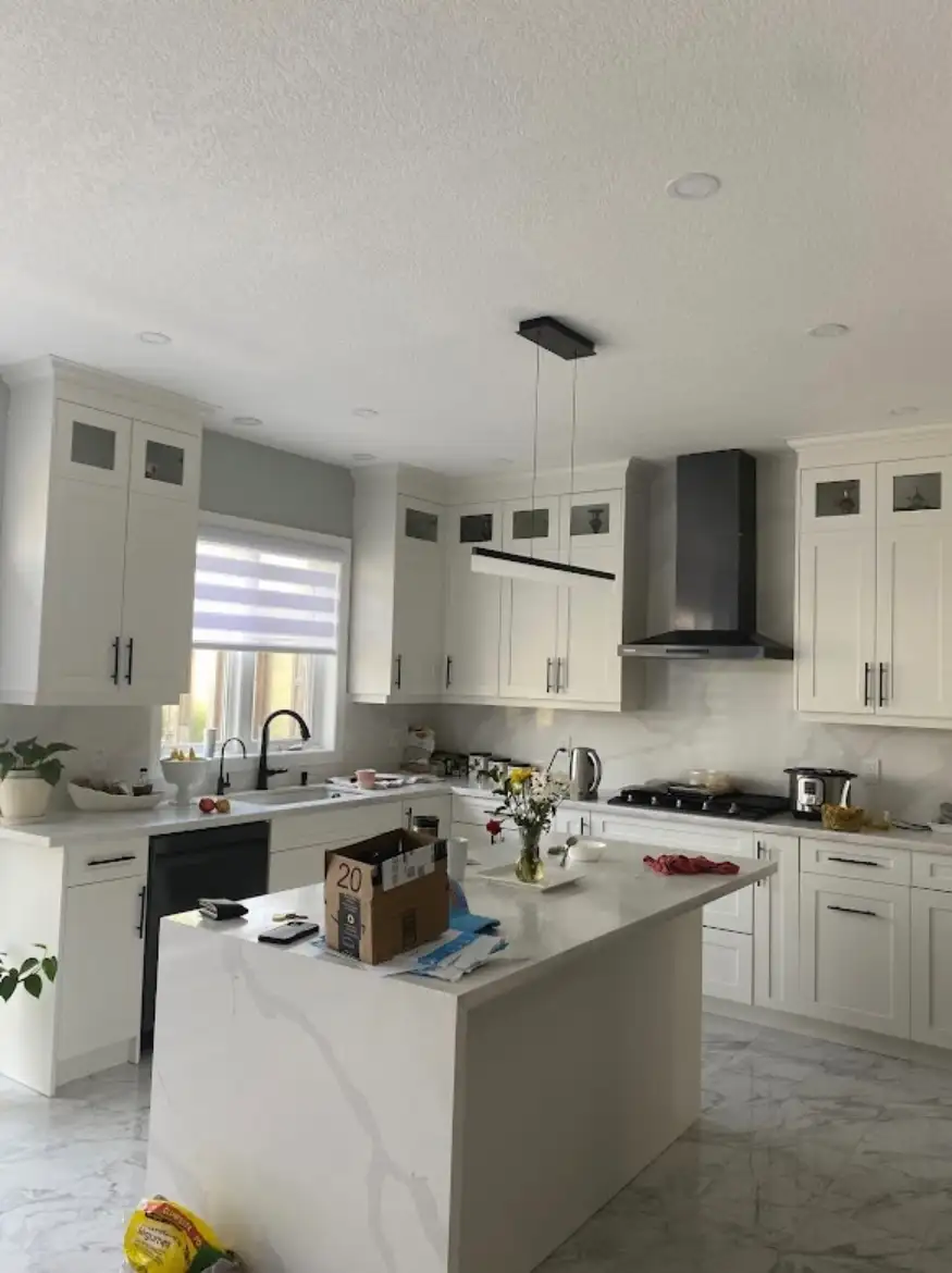 Cabinet painting project with crisp white finish