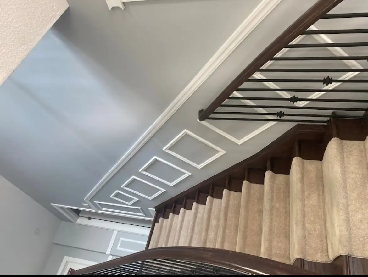 Trim and molding painting detail on a staircase
