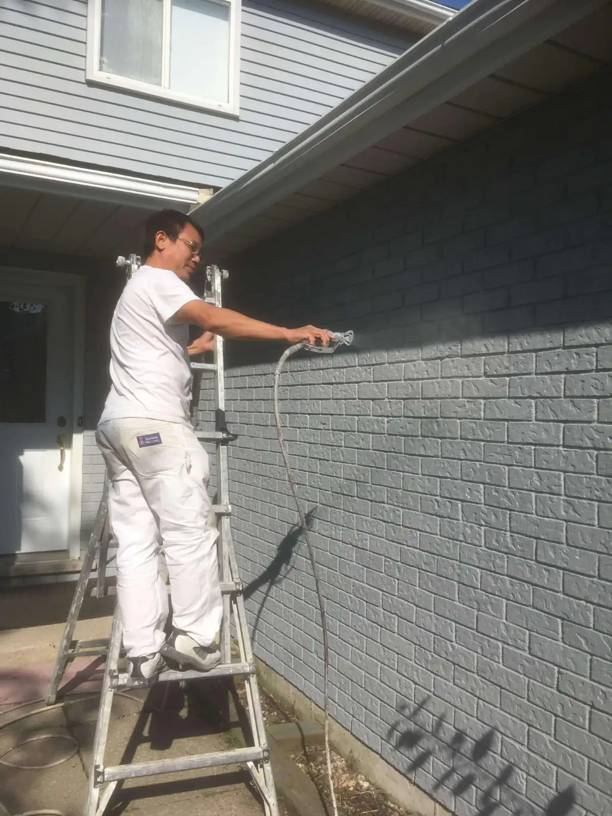 Exterior brick painting in Kitchener